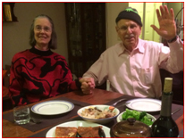 elderly man and woman at dinner