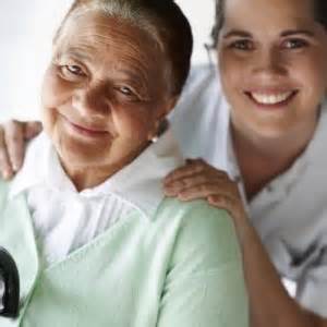 Elderly lady with caregiver